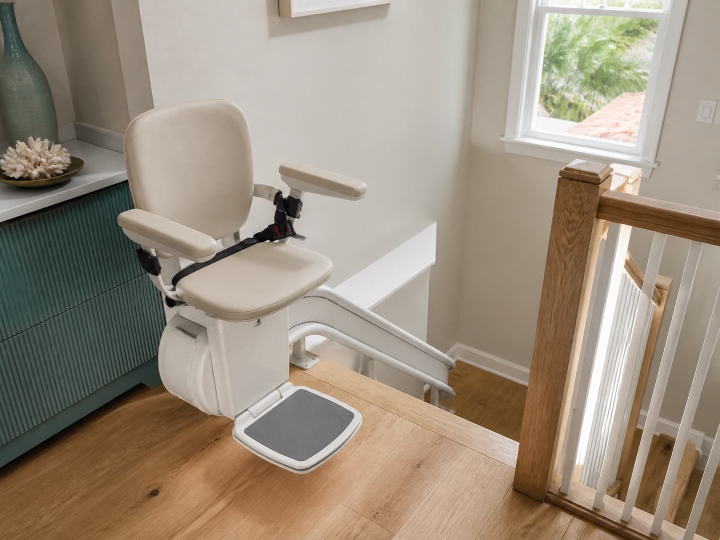 Older adult transferring safely from a residential stair lift