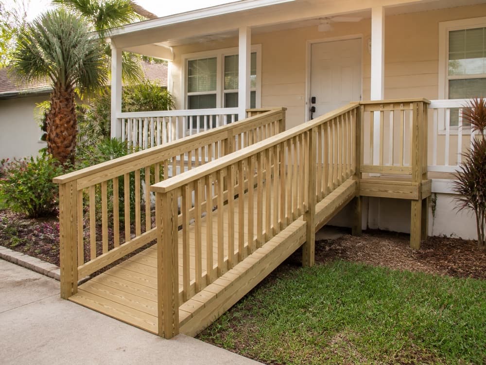 Custom wooden wheelchair ramp integrated with a residential front porch
